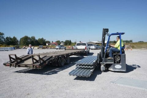 Loading Metal Decking on Trailer for Delivery